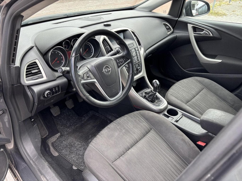 Opel Astra Sports Tourer 1.4 Turbo Airco Cruise Trekhaak, Voorwielaandrijving, Euro 5, Stof, Gebruikt