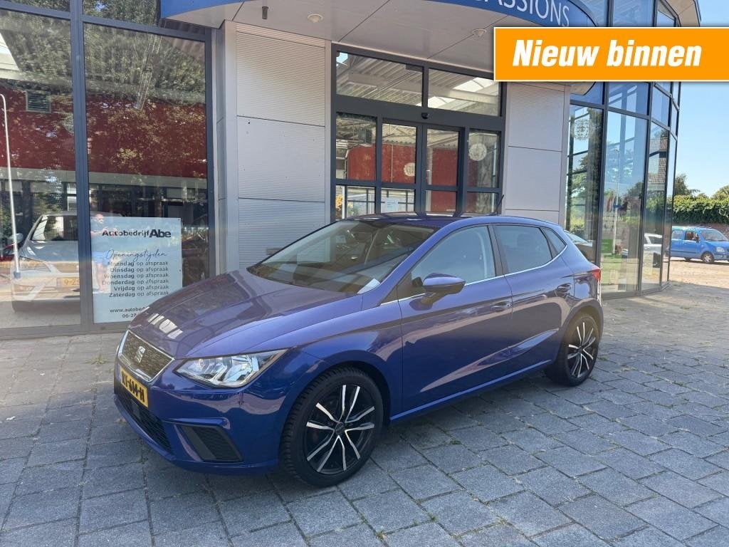 Seat IBIZA 1.0 TSI ST. BNS INT-5DEURS-LMV-AIRCO-NAVI-PDC-ORI, Auto's, Euro 6, 95 pk, Blauw, Ibiza