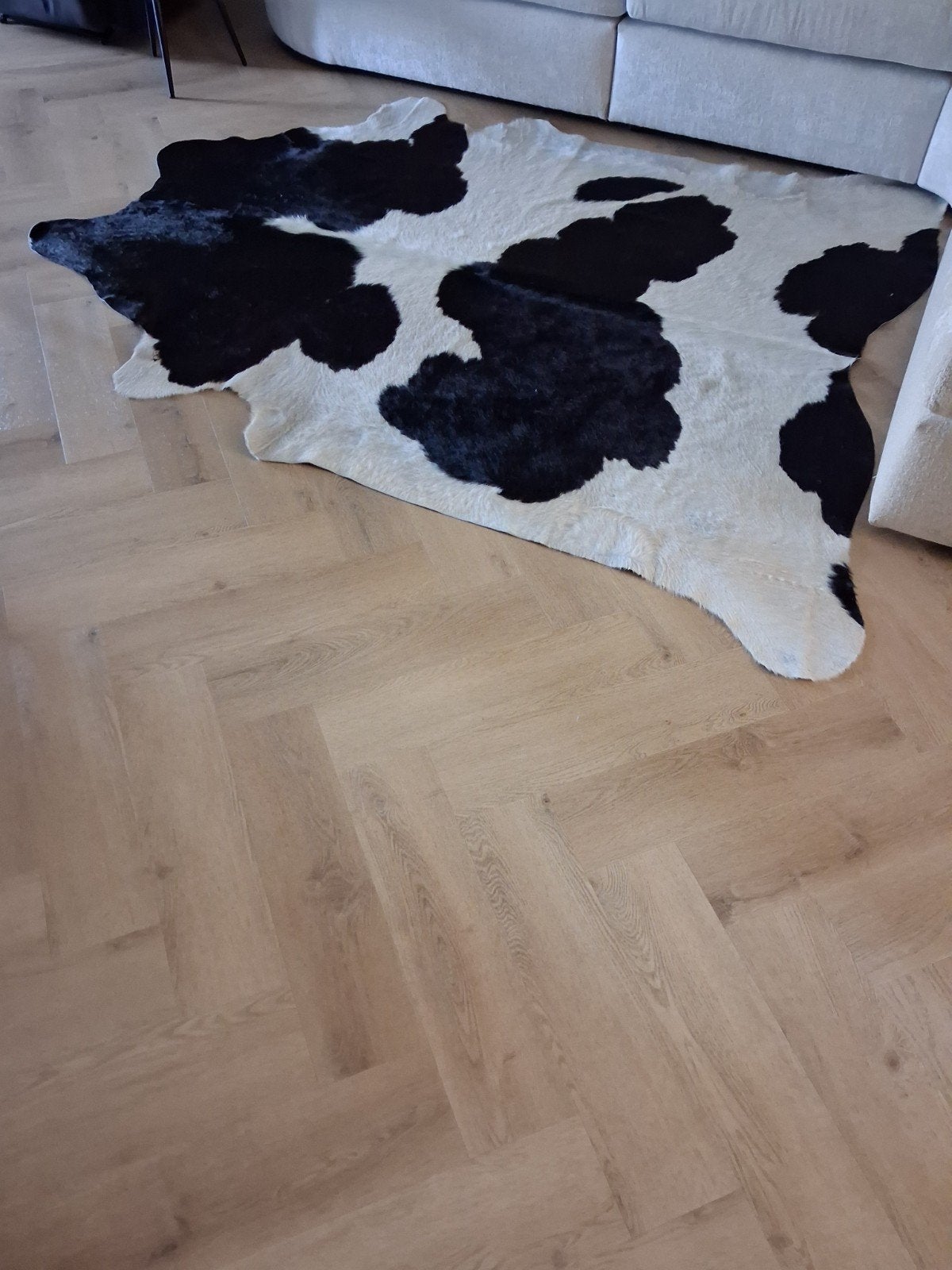 Zwart-wit koeienhuid vloerkleed, Ophalen, 100 tot 150 cm, Zo goed als nieuw, 150 tot 200 cm