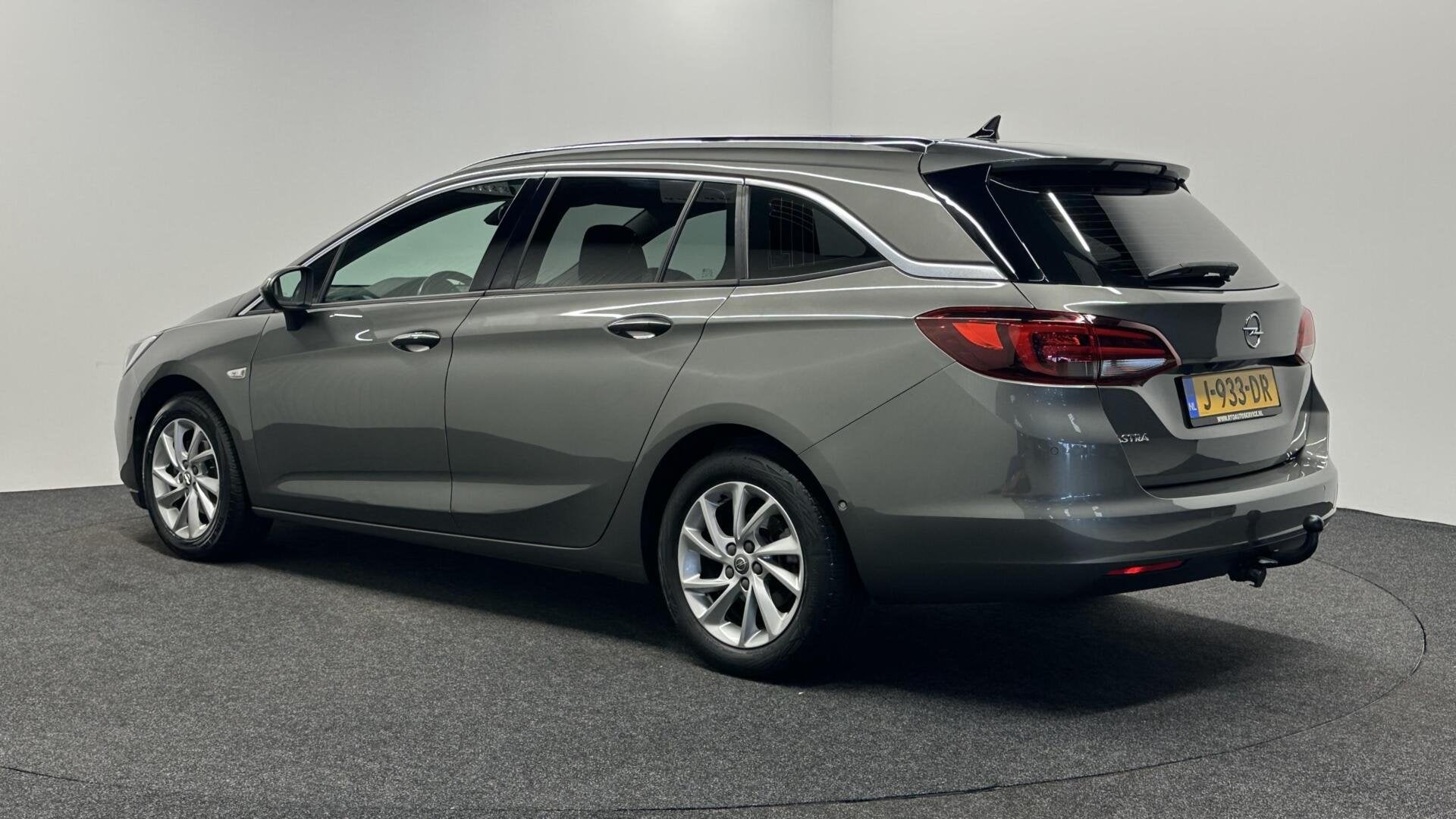 Opel Astra Sports Tourer 1.2 Elegance TREKHAAK CAMERA CLIMAT, Auto's, Voorwielaandrijving, Euro 6, 1199 cc, Met garantie (alle)