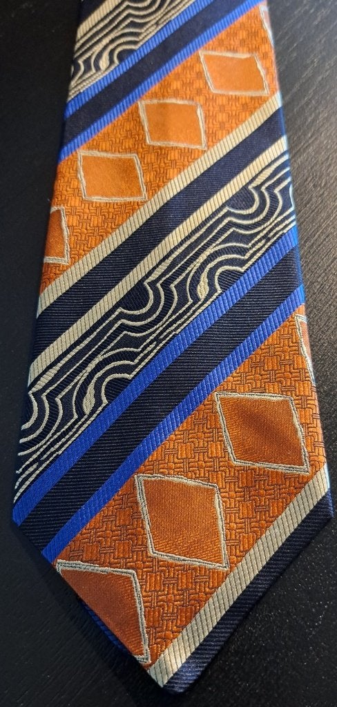 NKF Nederlandse Kabel Fabriek Delft stropdas oranje design, Ophalen of Verzenden, Nieuw, Gebruiksvoorwerp
