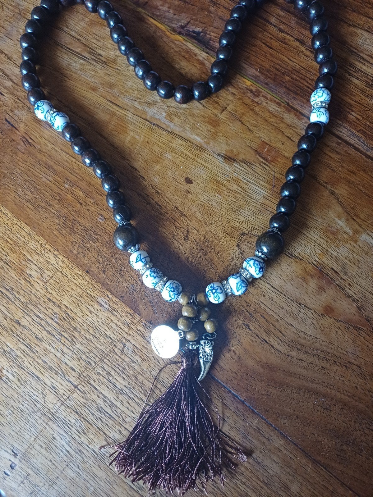 Houten kralen ketting met kwastje en hanger, Gebruikt, Bruin, Ophalen of Verzenden, Overige materialen
