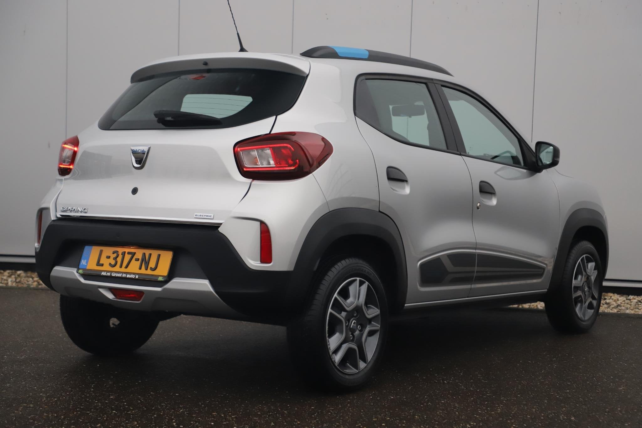 Dacia Spring Business 27 kWh Automaat Leder Navigatie Camera, Auto's, Dacia, Gebruikt, 920 kg, Parkeersensor, 30 €/maand