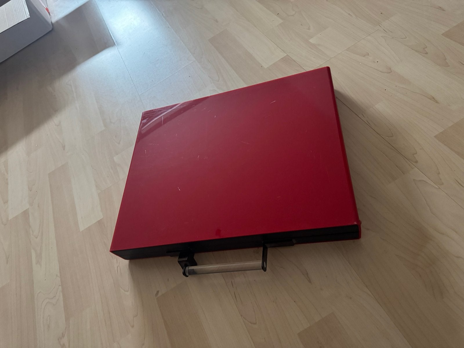 Rode akte tas, Ophalen, Gebruikt
