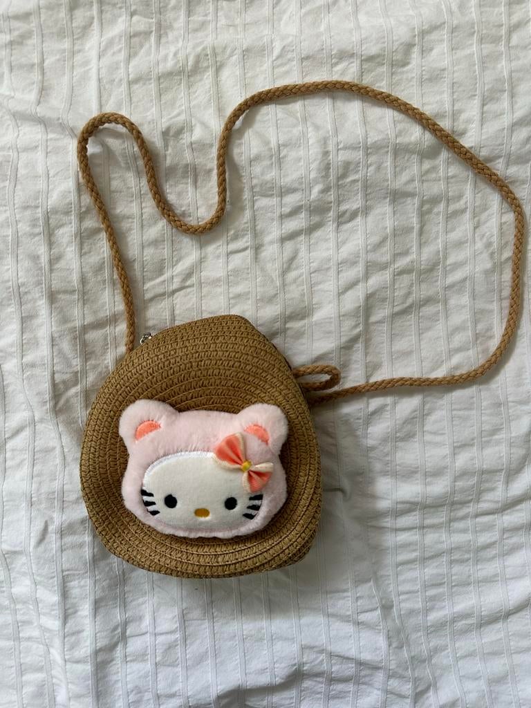 Hello Kitty Strooien Schoudertasje uit Bali, Ophalen of Verzenden, Nieuw, Bruin, Overige merken