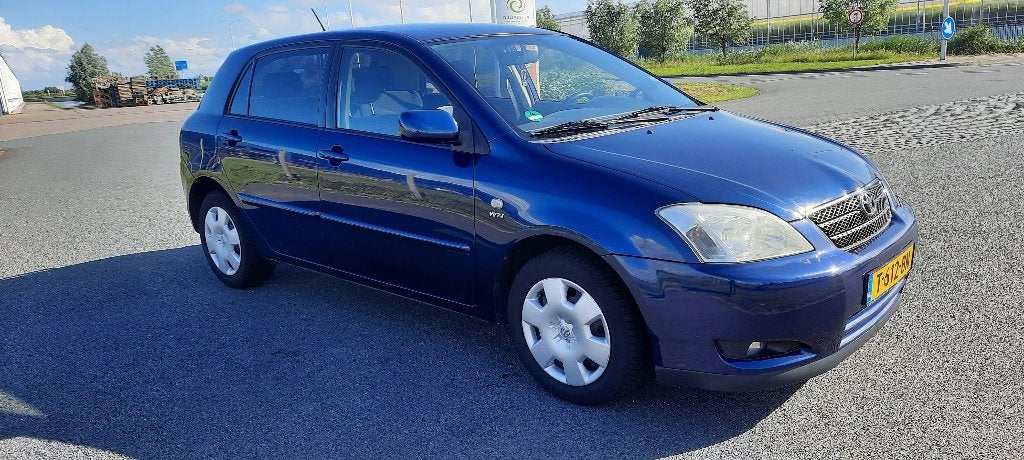 Toyota Corolla 1.6 Vvt-i 5DR Linea SOL 2004 km stand 137100, Auto's, Voorwielaandrijving, 4 cilinders, Blauw, Corolla