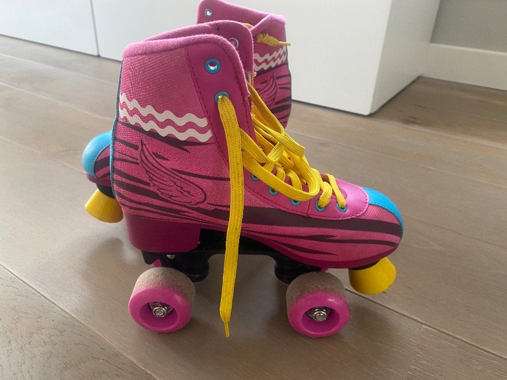 Rolschaatsen, Ophalen of Verzenden, Zo goed als nieuw, Dames