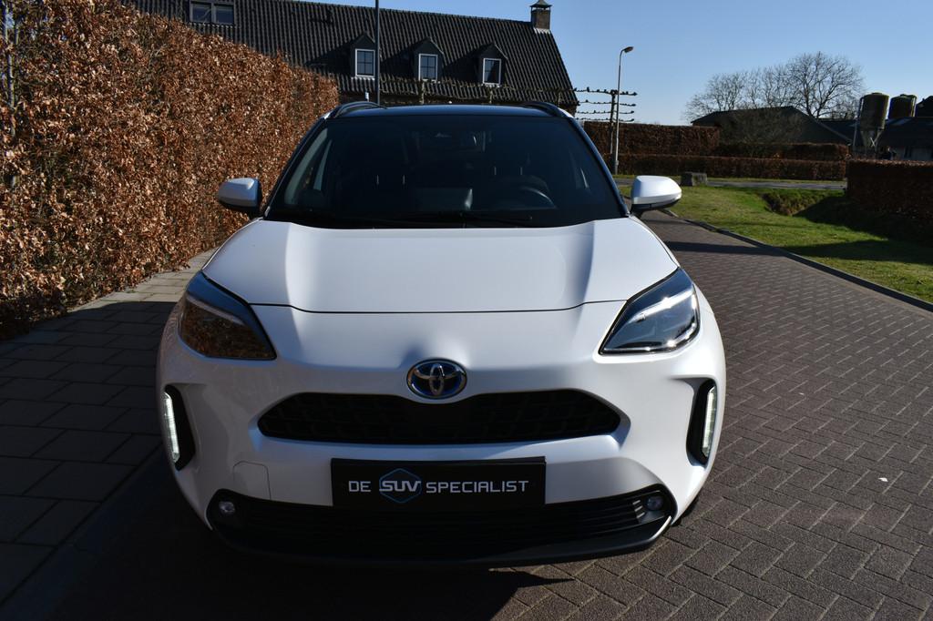 Toyota Yaris Cross 1.5 Hybrid '23 Adventure, Pano, NIEUWSTAA, Stof, Gebruikt, Met garantie (alle), Wit