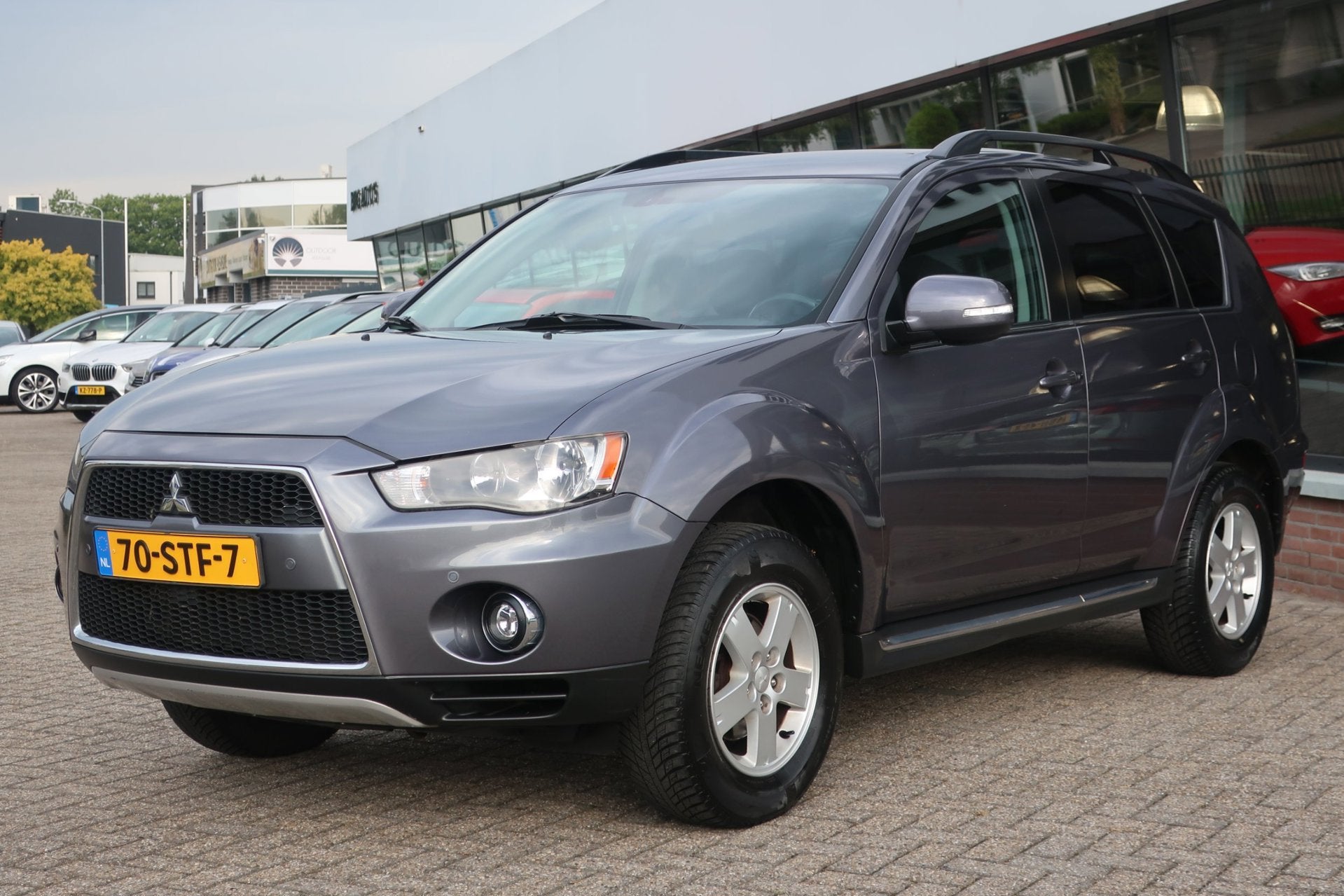Mitsubishi Outlander 2.0 Intro Edition 2e EIG_CLIMA_CRUIS_PD, Auto's, Zwart, 4 cilinders, Origineel Nederlands, Bedrijf