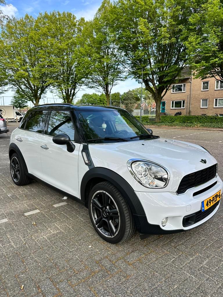 Mini Countryman 1.6 Cooper S All4 AUT 2011 Wit, Auto's, Mini, 1380 kg, Wit, Origineel Nederlands, 75 €/maand