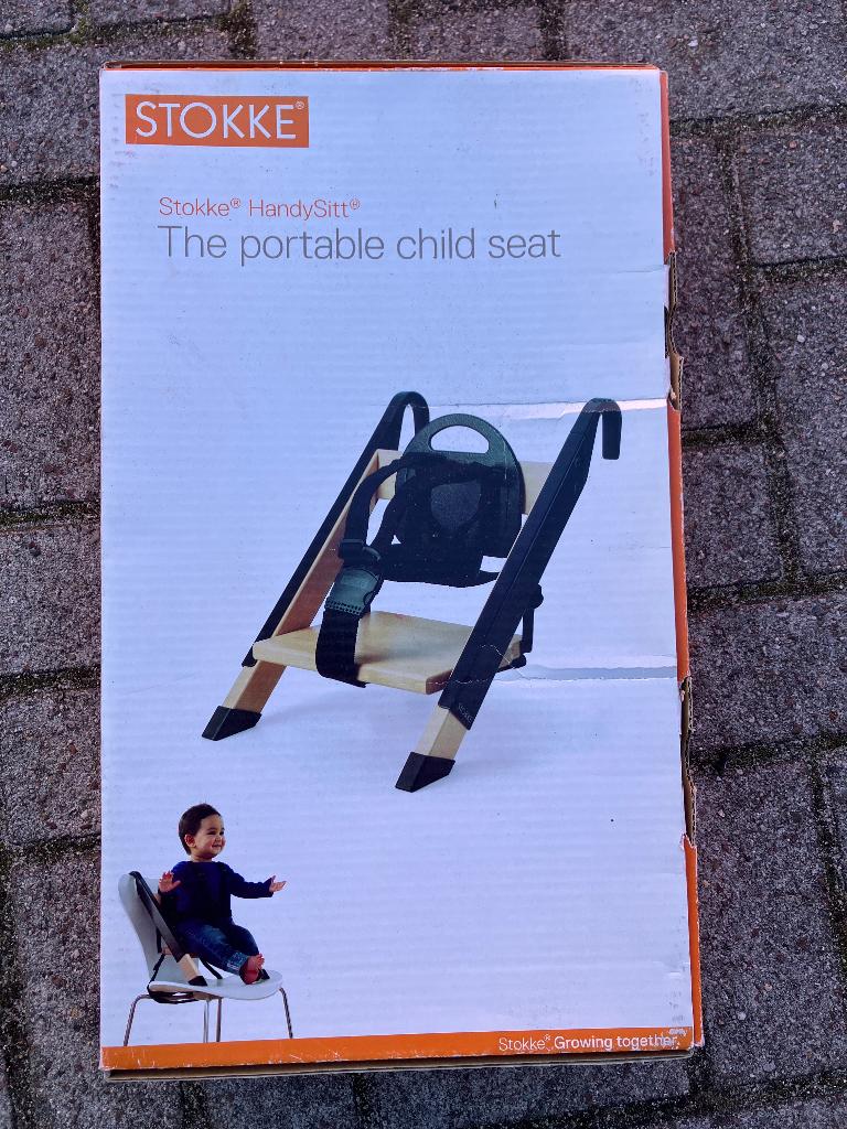 Stokke Handysitt - Draagbaar Kinderzitje / Reisstoeltje, Ophalen of Verzenden, Zo goed als nieuw, Meegroeistoel