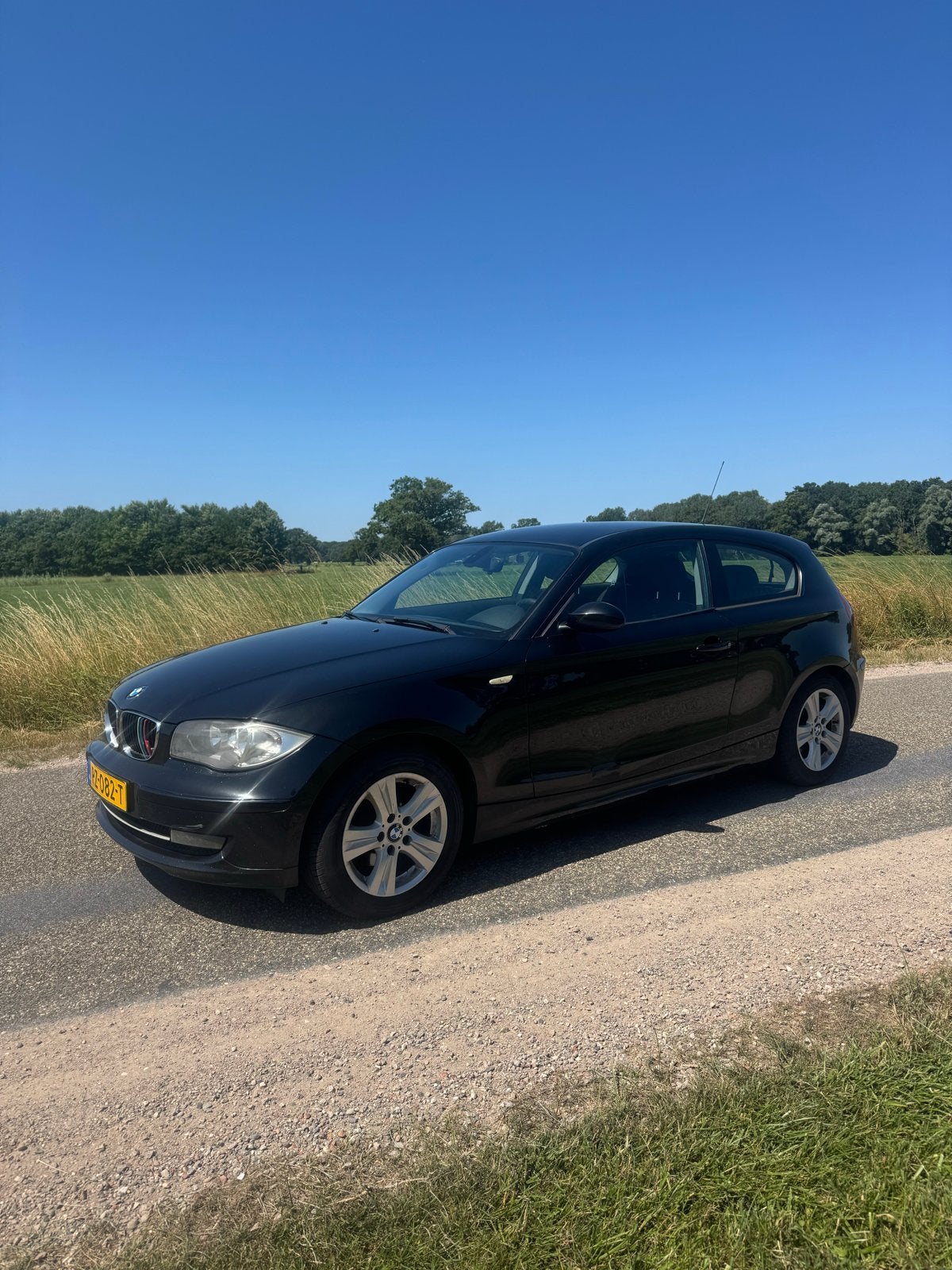 BMW 1-Serie 118d 143pk 3D 2009 Zwart, Auto's, BMW, 1-Serie, Achterwielaandrijving, 1995 cc, 4 stoelen