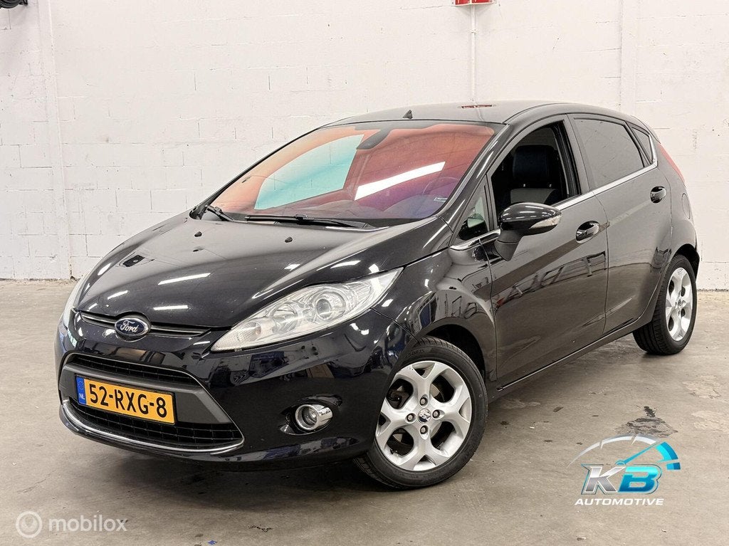 Ford Fiesta 1.6 TDCi Ghia, Auto's, Ford, Voorwielaandrijving, Gebruikt, 96 €/maand, Leder en Stof