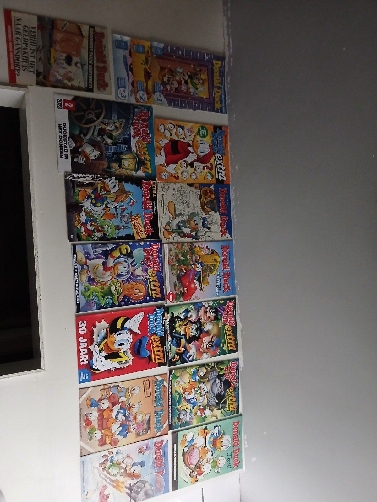 Collectie Donald Duck en Donald Duck Extra stripboeken, Meerdere stripboeken, Ophalen of Verzenden, Gelezen