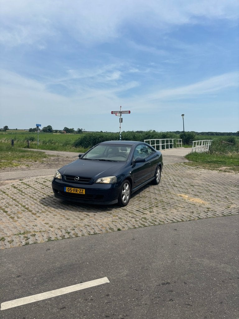 Opel Astra G 1.8I 16V Coupe 2000 Blauw - APK 06-2027, 1160 kg, 1250 kg, Beige, 4 cilinders