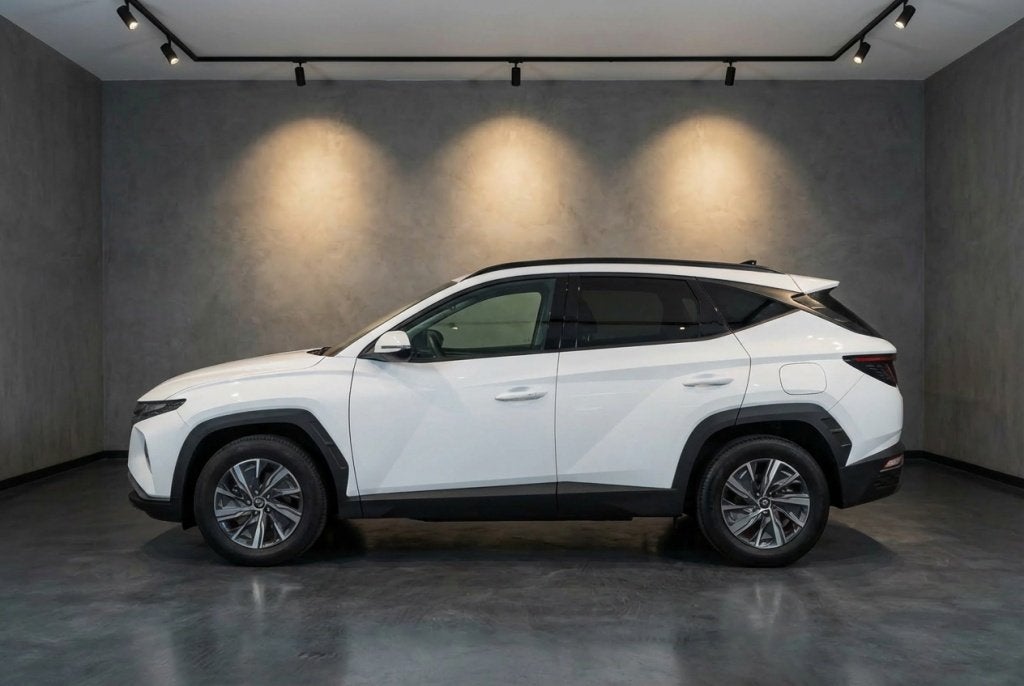 Hyundai Tucson 1.6 T-GDI HEV Comfort | Carplay | Camera | Ad, Auto's, Gebruikt, 4 cilinders, Wit, Bedrijf