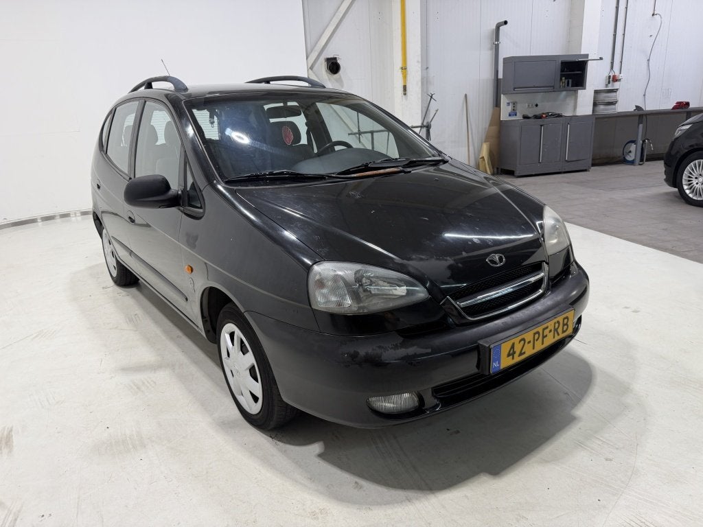 Daewoo Tacuma 1.6-16V Style, Auto's, Voorwielaandrijving, Stof, Zwart, Origineel Nederlands
