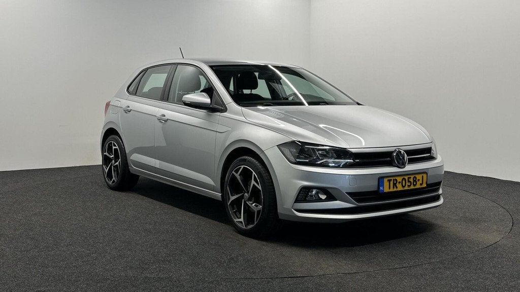 Volkswagen Polo 1.0 TSI CARPLAY TREKHAAK NAVI ADAPTIVE CRUIS, Voorwielaandrijving, Stof, Met garantie (alle), 23 km/l