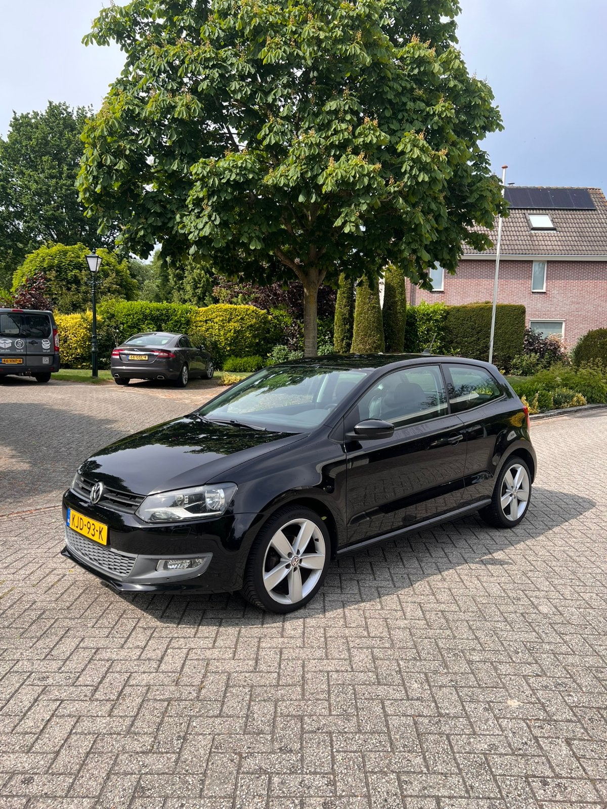Volkswagen Polo 1.2 TSI Highline | PDC | Clima | Leer/Alca, Auto's, Voorwielaandrijving, Zwart, Zwart, 988 kg