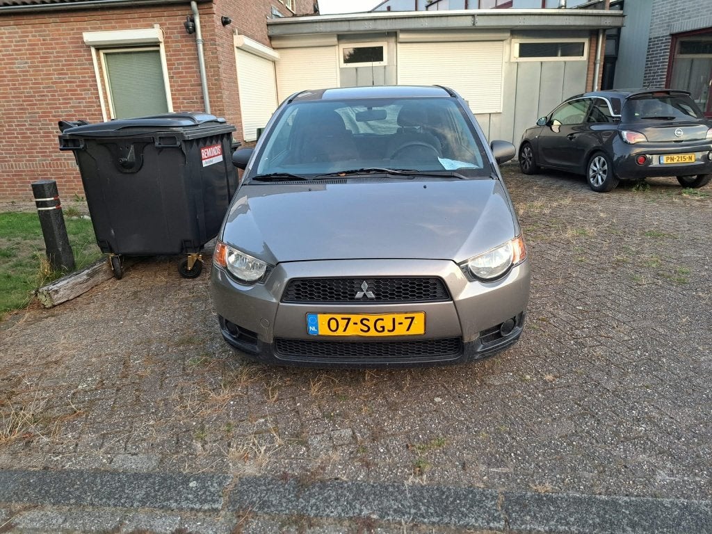 Mitsubishi Colt 1.1 3-DR 2011 Grijs, Auto's, Voorwielaandrijving, Stof, 74 pk, Colt