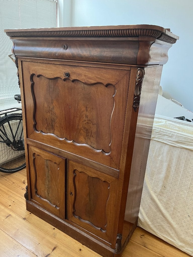 Biedermeier secretaire, Ophalen