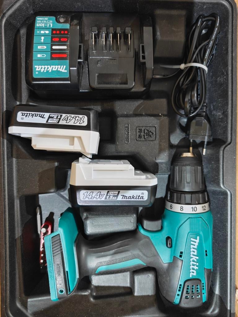 Makita Accu Schroefboormachine DF347D met 2 accu's en lader, Gebruikt, Variabele snelheid, Ophalen of Verzenden, Boor- en Schroefmachine