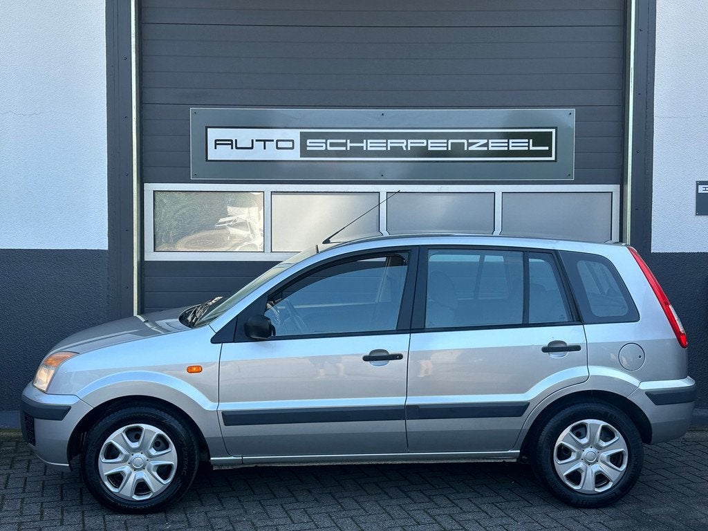 Ford Fusion 1.4-16V Champion | AIRCO | 35dkm | NL AUTO | NAP, Auto's, Ford, Voorwielaandrijving, Zwart, Origineel Nederlands, Bedrijf