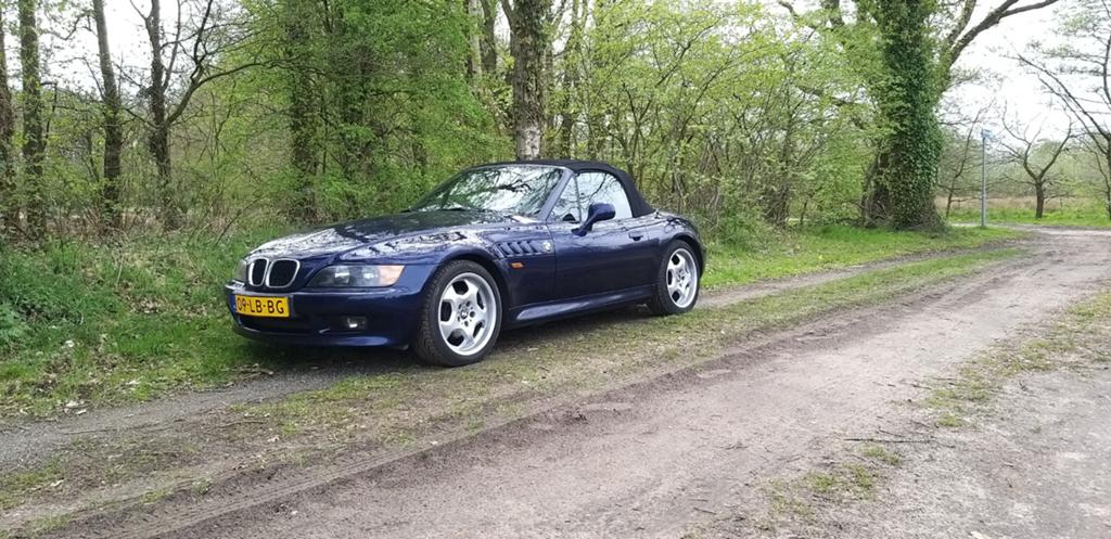 BMW Z3 1.8 Roadster 1997 Blauw, Auto's, Achterwielaandrijving, Zwart, 4 cilinders, Cabriolet