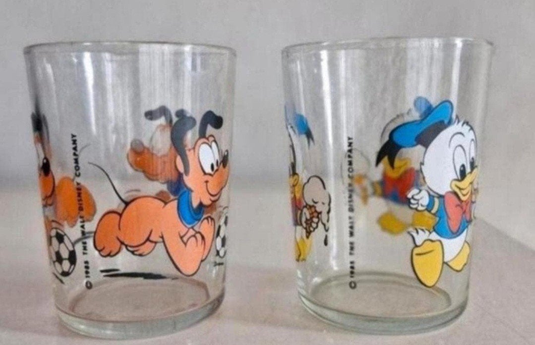 Vintage Disney glazen: Pluto en Donald Duck (1983), Ophalen of Verzenden, Goofy of Pluto, Gebruikt, Servies