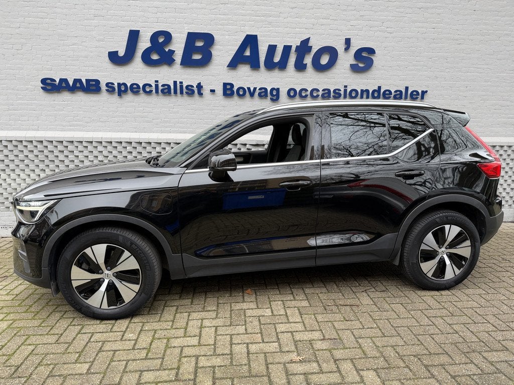 Volvo XC40 1.5 T4 Recharge Core Bright Carplay Achteruitrijc, Auto's, Volvo, Stof, 129 pk, Zwart, Plug-in hybride