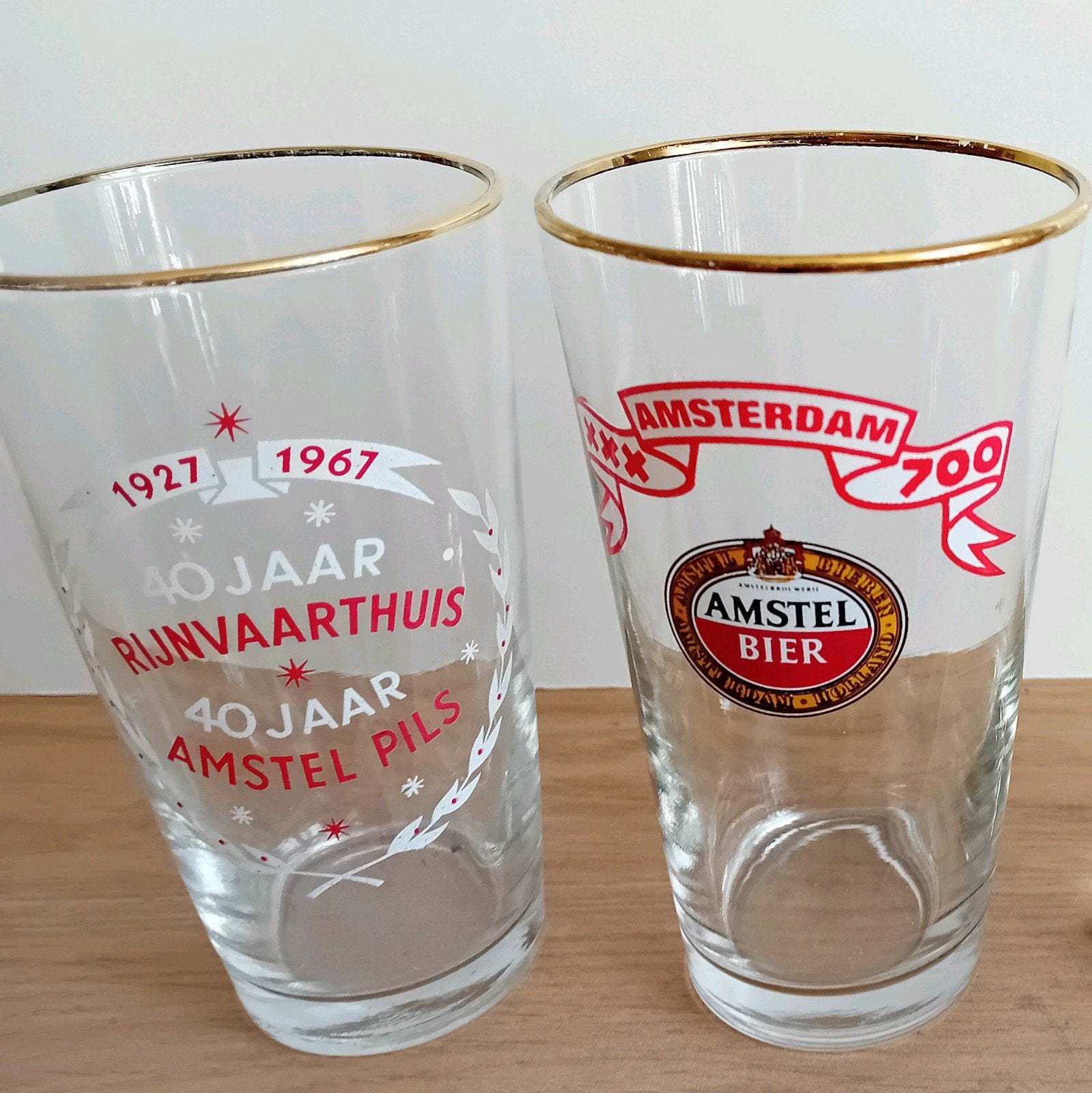 9 Amstel glazen met opdruk, Ophalen of Verzenden, Zo goed als nieuw, Glas of Glazen, Amstel