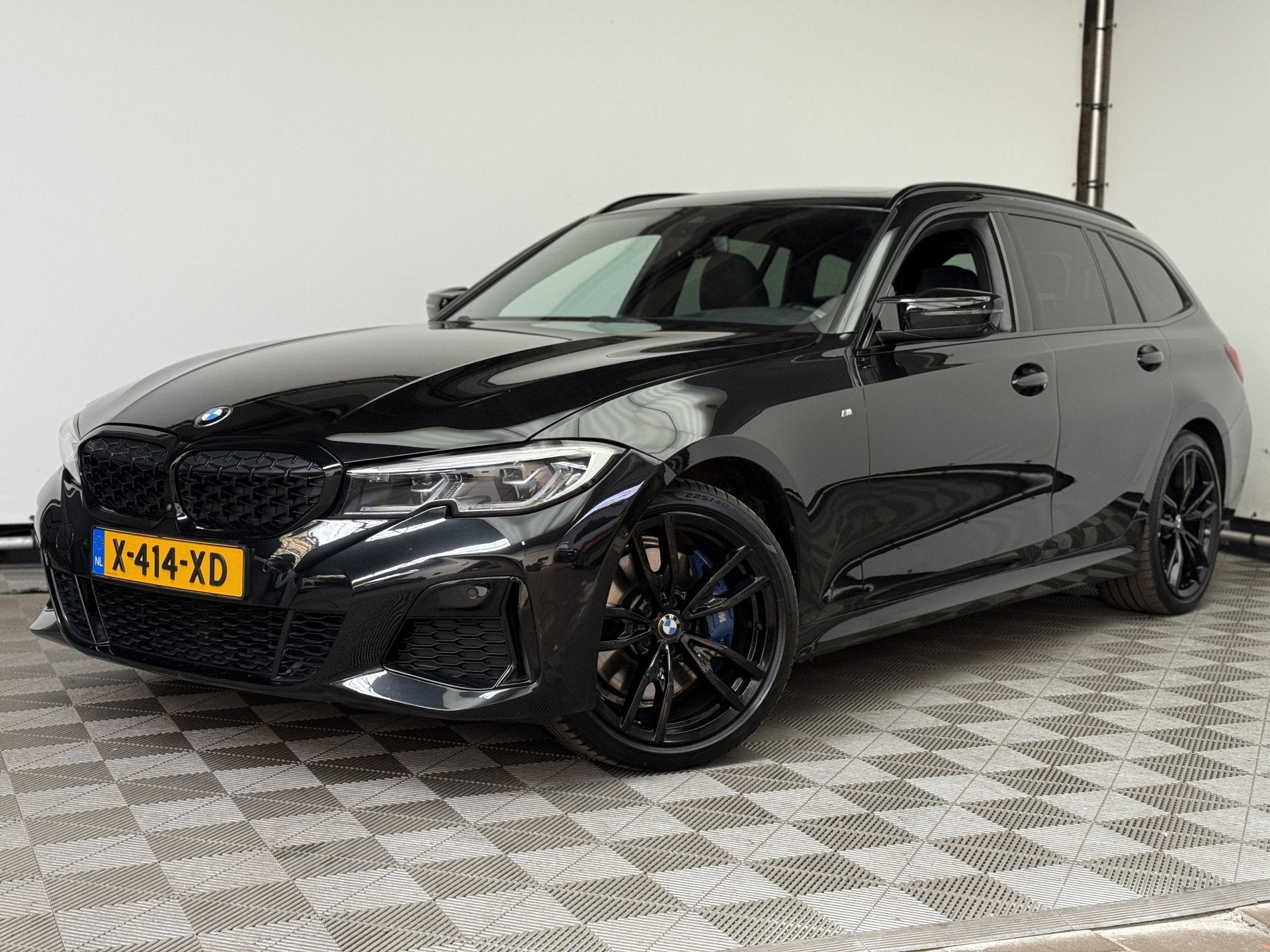 BMW 3 Serie Touring M340i xDrive High Executive Zeer Complet, Auto's, BMW, 1780 kg, Met garantie (alle), Zwart, Leder