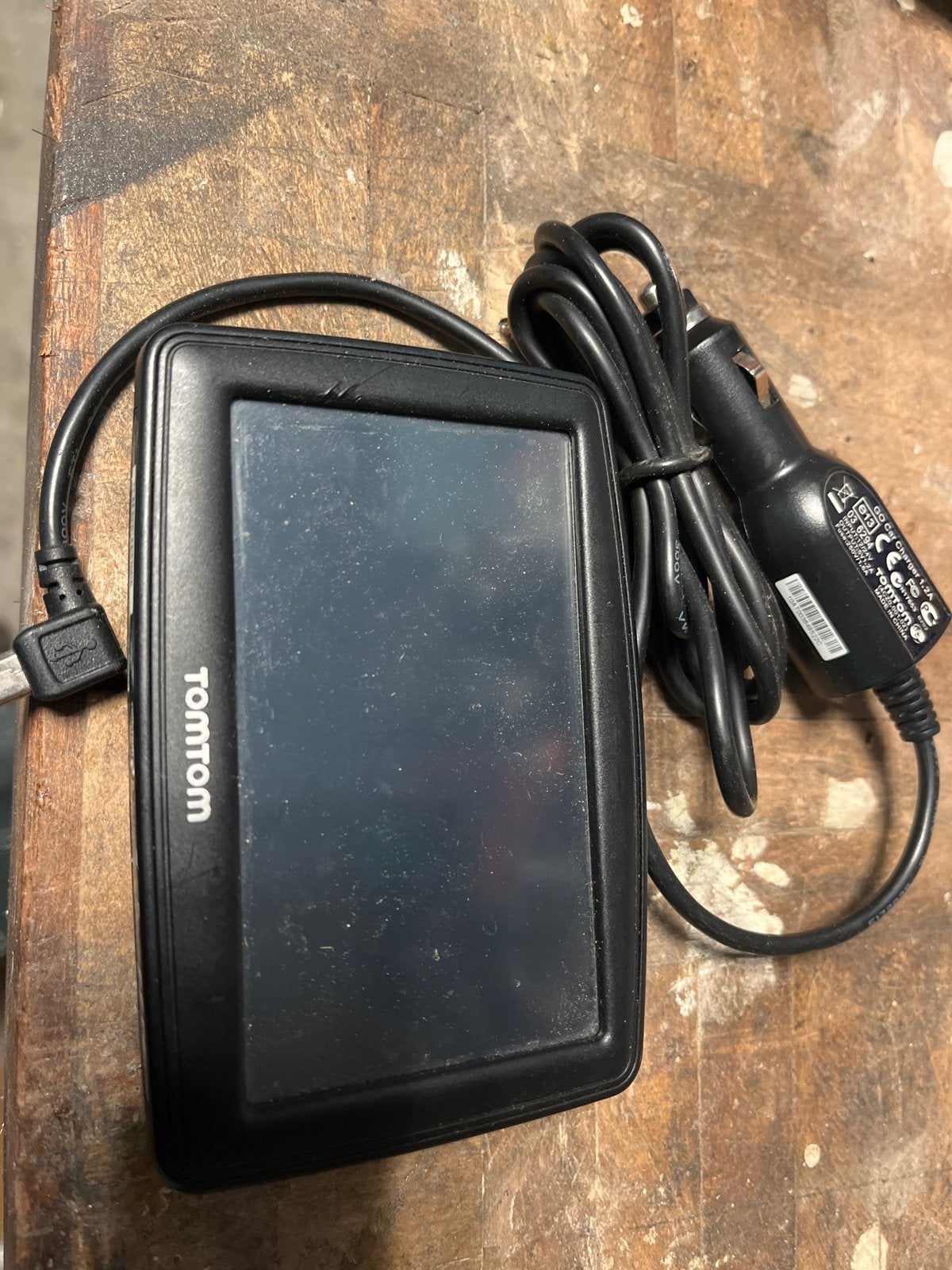 TomTom Navigatiesysteem met autolader, Ophalen of Verzenden, Gebruikt