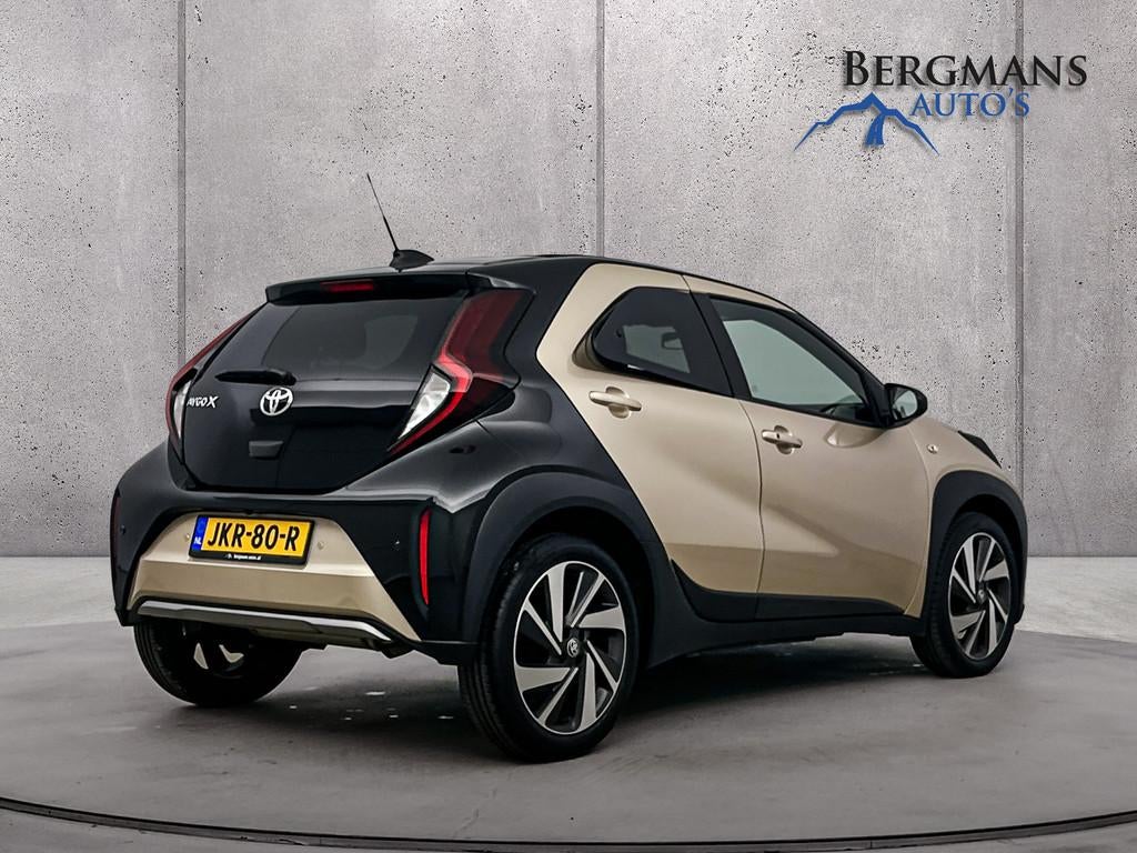 Toyota Aygo X 1.0 VVT-i S-CVT Envy // 1E EIGENAAR // ELEKTRI, Auto's, Toyota, Stof, Gebruikt, Bruin, 4 stoelen