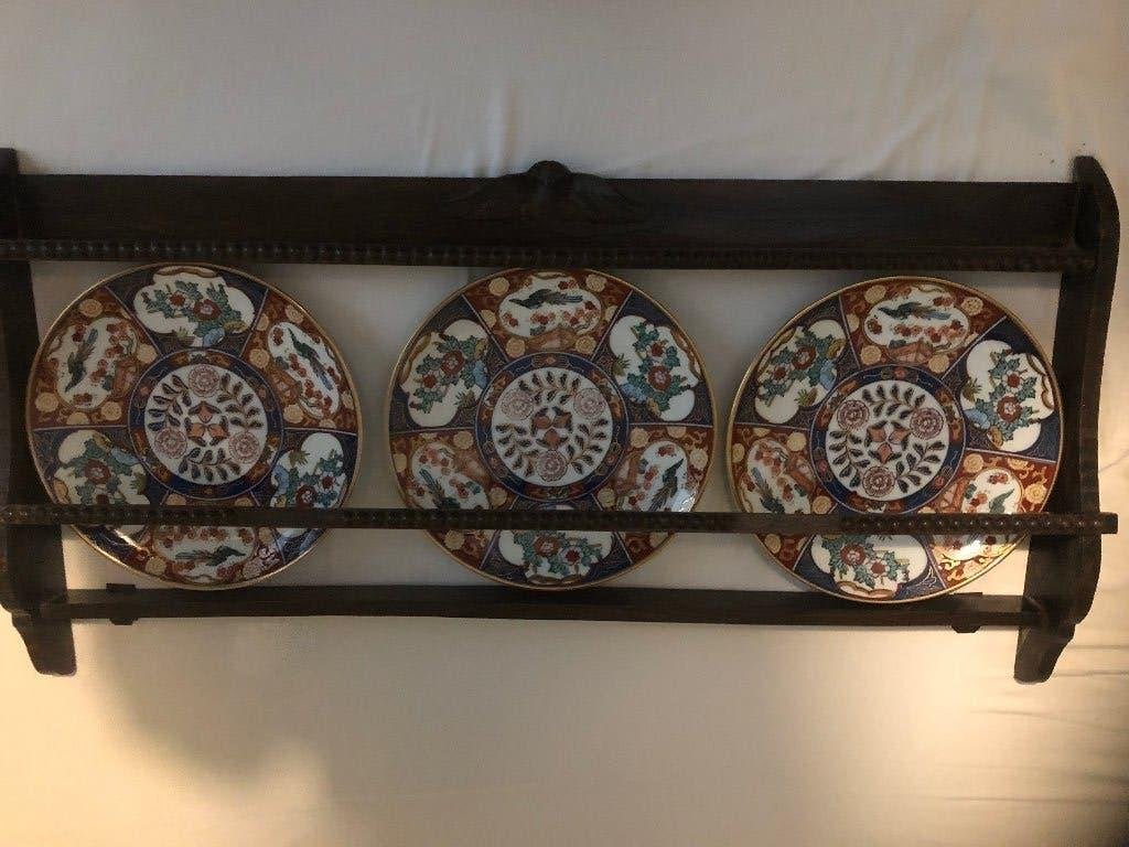 Gold Imari borden met wandrek, Ophalen