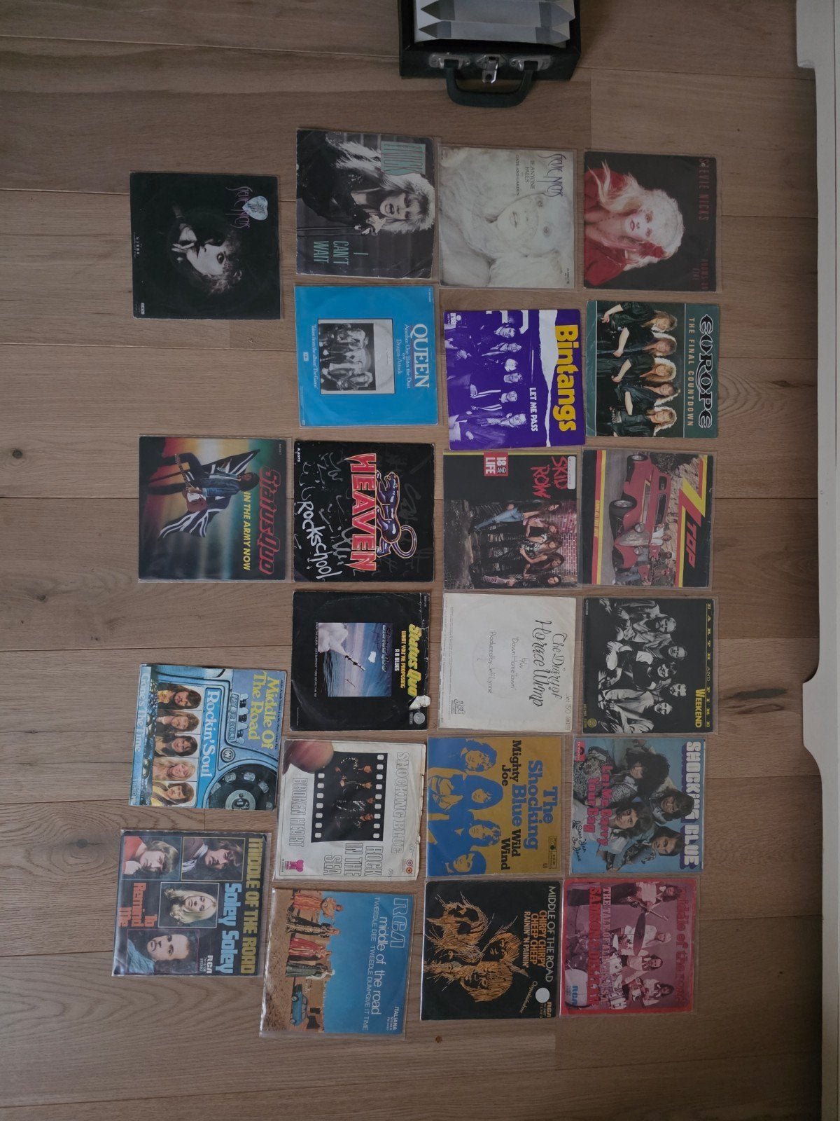 singles in koffertje goede staat, Ophalen, Zo goed als nieuw