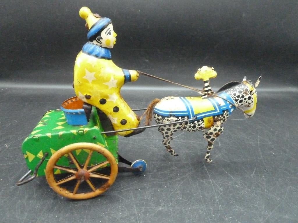 Opwindbaar blikken paardenkar met clown, Ophalen of Verzenden