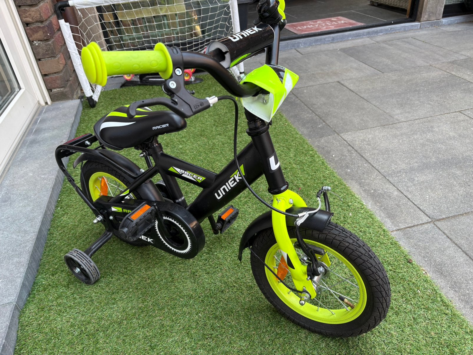 Stoere 12 inch kinderfiets, Fietsen en Brommers, Ophalen, Zo goed als nieuw, Minder dan 16 inch, Zijwieltjes