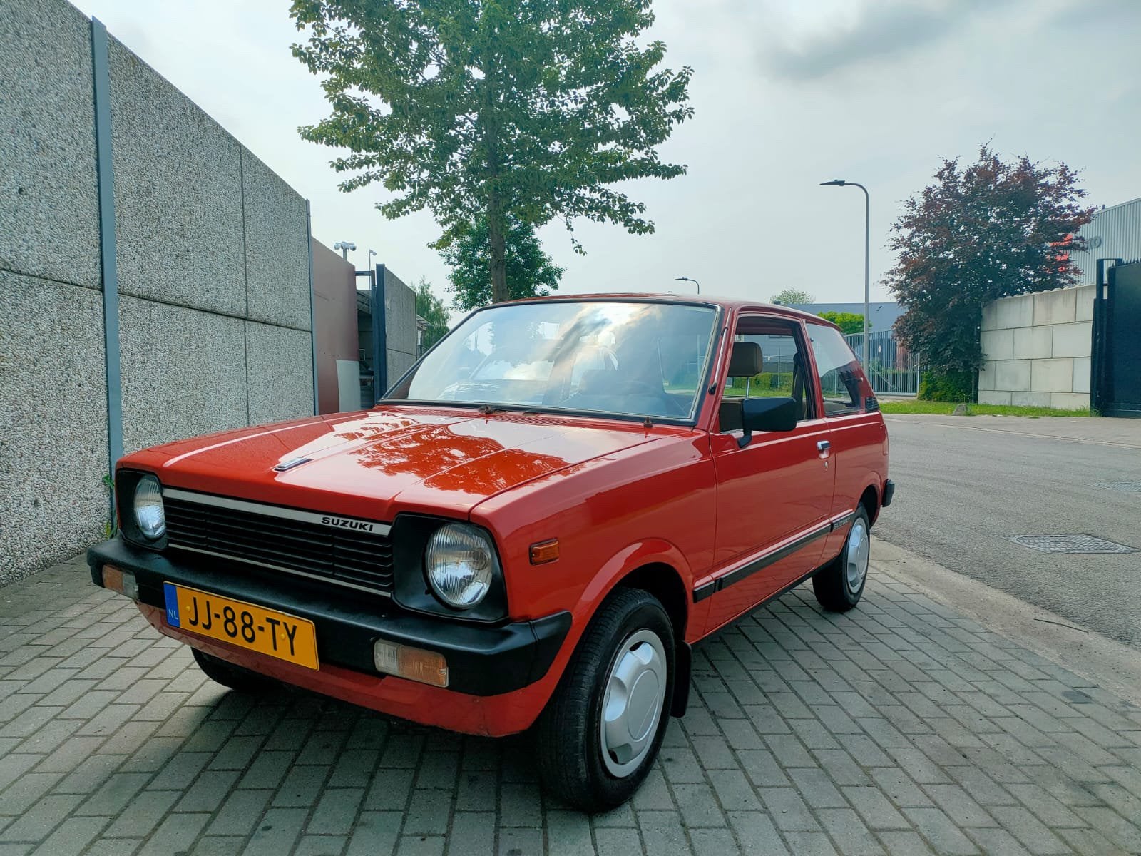 Suzuki Alto 0.8 AUT 1983 Rood, Leder en Stof, Particulier, 3 cilinders, 796 cc