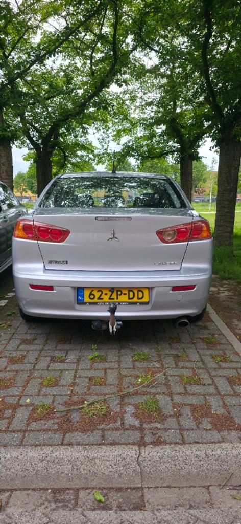 Mitsubishi Lancer 1.5 Mivec Sports Sedan 2008 Grijs (Schade), Auto's, Mitsubishi, Voorwielaandrijving, 4 cilinders, Handgeschakeld