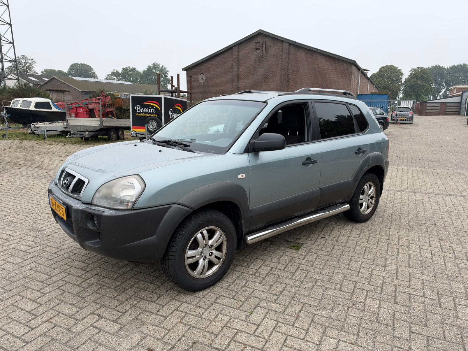 Hyundai Tucson 2.0 I 2WD 2009 Grijs, Dealer onderhouden, Stof, 4 cilinders, Origineel Nederlands