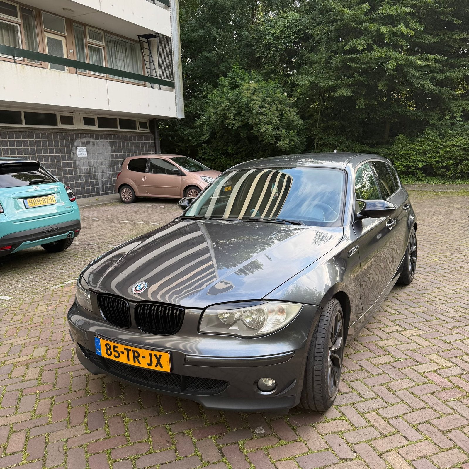 BMW 1-Serie 2.0 118I AUT 2007 Grijs, Auto's, BMW, Achterwielaandrijving, 1995 cc, 4 cilinders, 129 pk