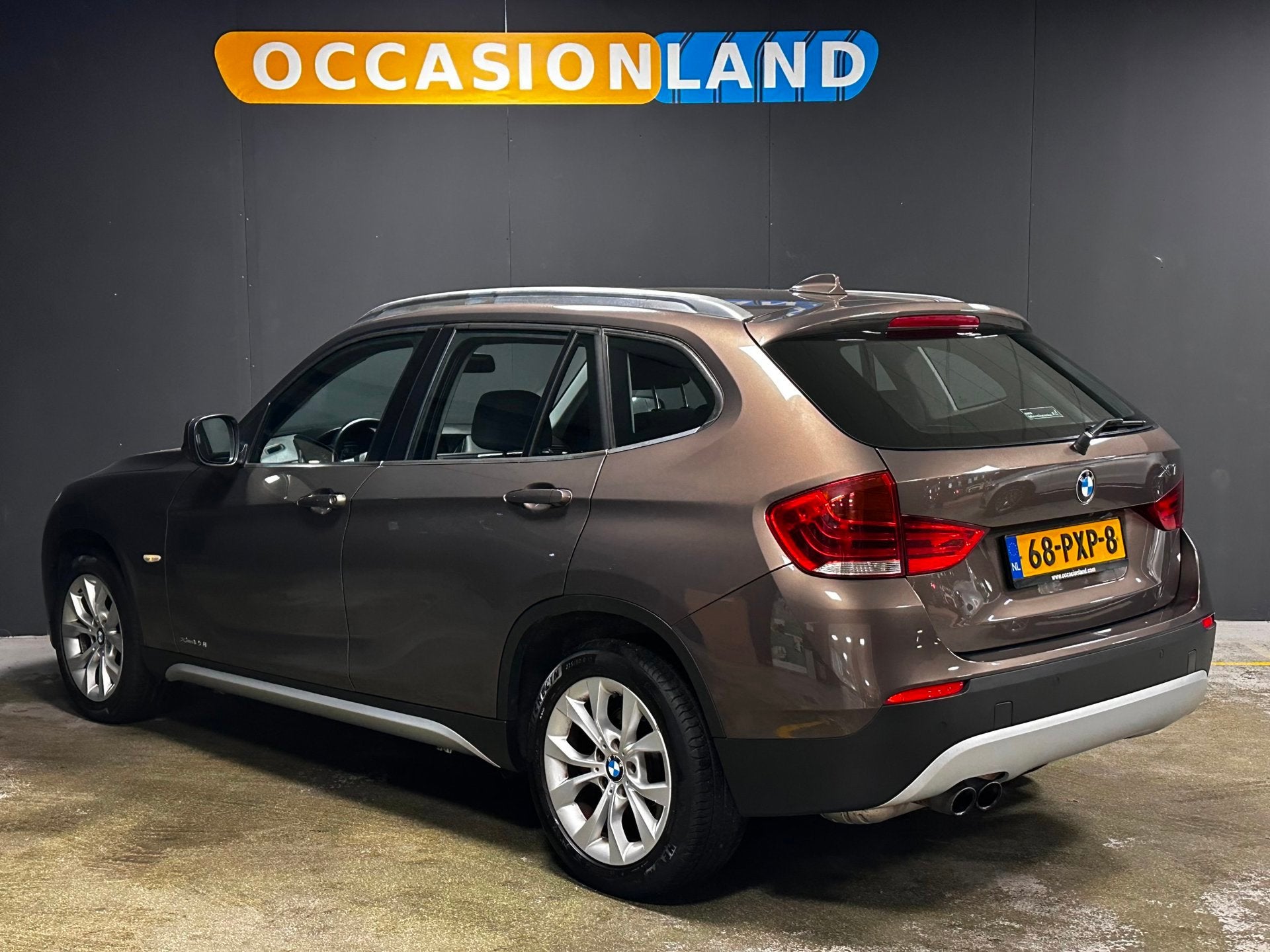 BMW X1 XDrive28i Executive|AUTOMAAT|CRUISE|BLUETOOTH|NAVI|CA, Auto's, BMW, Euro 5, Stof, Gebruikt, Zwart