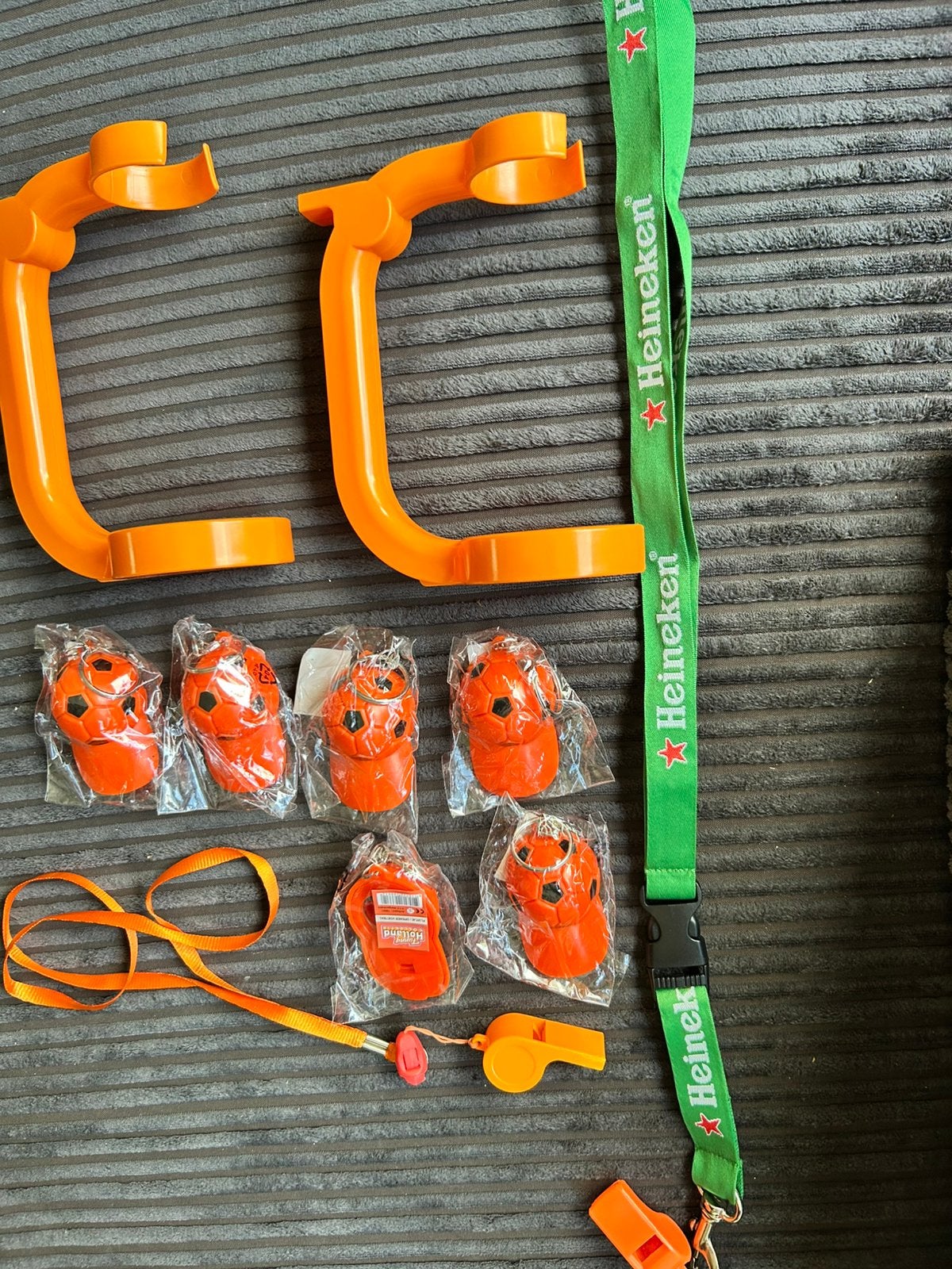 Aantal Oranje fluitjes openers keykoord en fles houders, Ophalen of Verzenden, Zo goed als nieuw, Overige typen