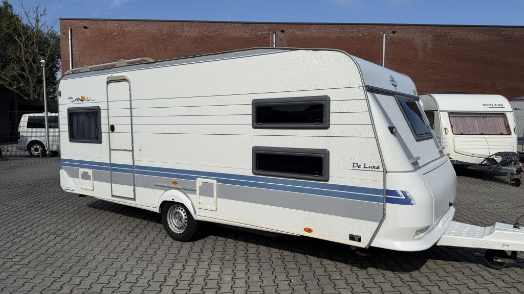Hobby De Luxe 540 UK bouwjaar 2000 met voortent en luifel, Overige typen, Hobby, Bedrijf, Treinzit