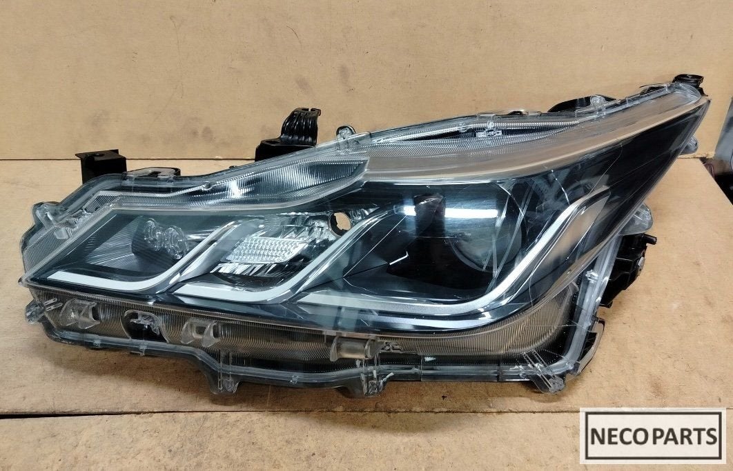 TOYOTA COROLLA E21 SEDAN LED KOPLAMP 81150-02T31 ORIGINEEL, Auto-onderdelen, Verlichting, Gebruikt, -, -, Ophalen of Verzenden