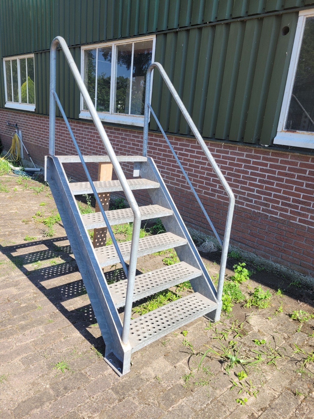Stevige gegalvaniseerde metalen bordestrap, Ophalen