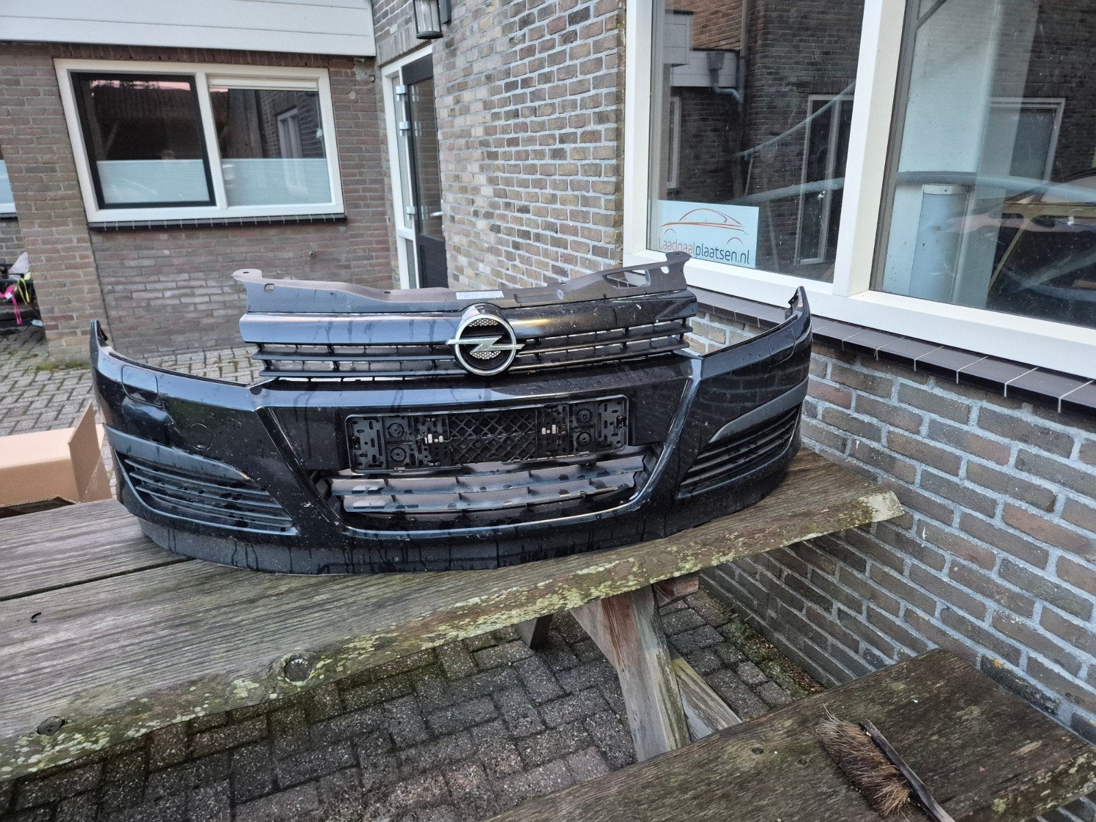 Voorbumper Astra H 2004-2009 zwart, Gebruikt, Voor, Opel, Ophalen of Verzenden