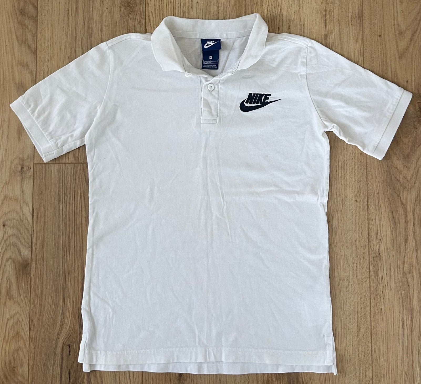 Als nieuw Nike polo shirt kraag boord wit L 146 152 158, Ophalen of Verzenden, Zo goed als nieuw, Jongen, Shirt of Longsleeve