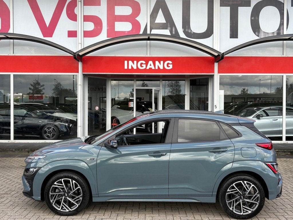 Hyundai KONA 1.0 T-GDI MHEV 120PK N-LINE SCHUIFDAK KRELL NAV, Auto's, Gebruikt, Huisgarantie, Met garantie (alle), Bedrijf